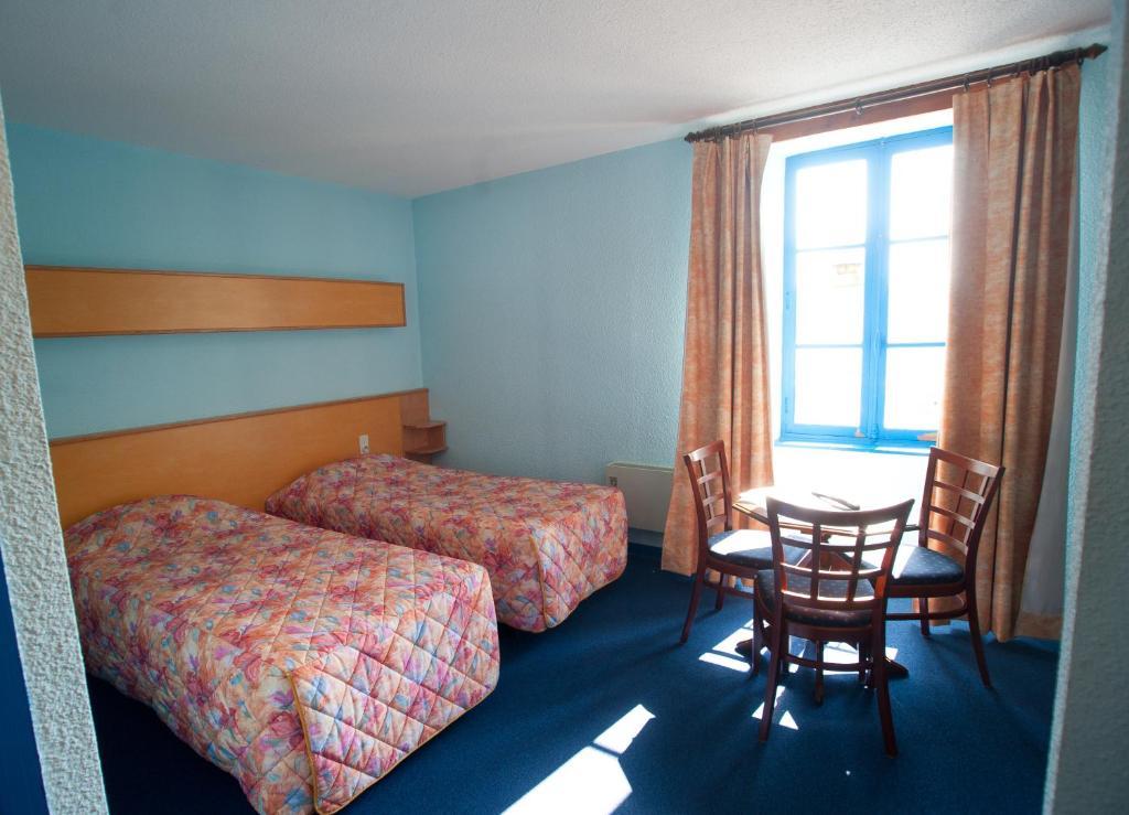 Citotel Hotel Le Commerce Severac-d'Aveyron Quarto foto